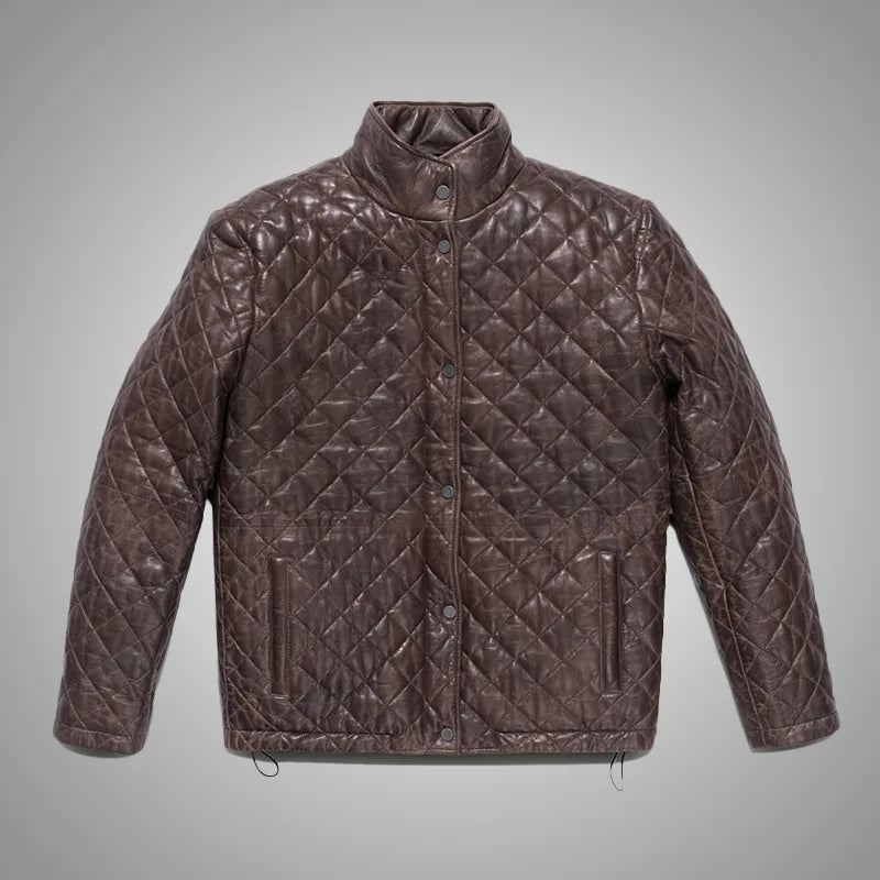 Quilted brown jacket on a gray background