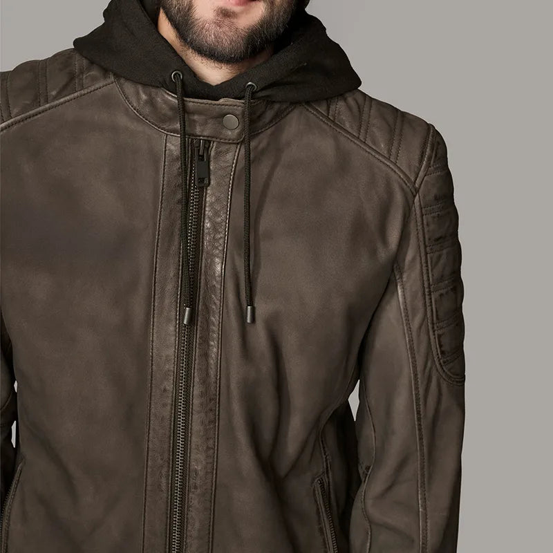 Brown leather jacket with a hood on a gray background