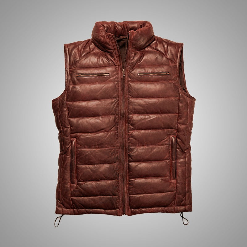 Brown quilted vest on a gray background