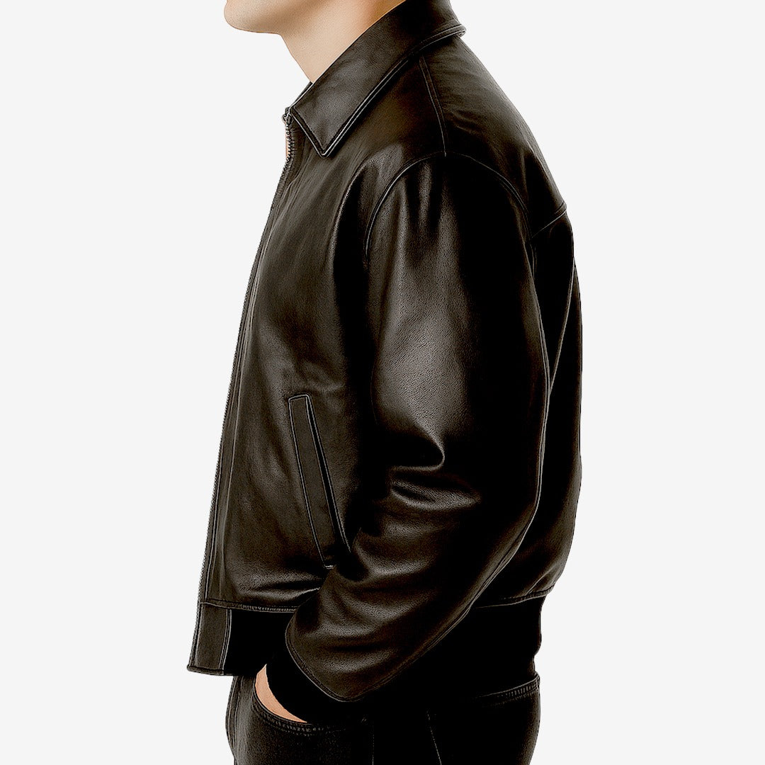 Brown leather jacket worn by a person on a white background
