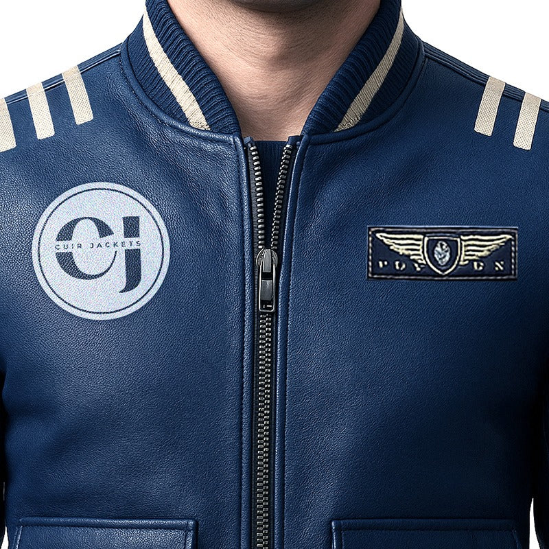 Close-up of a blue jacket with logos and stripes on a white background