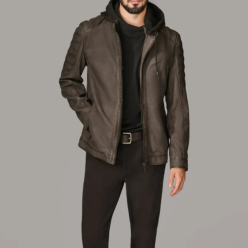 Man wearing a brown leather jacket on a gray background