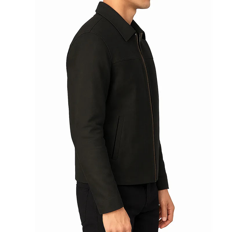 Black jacket worn by a person on a white background