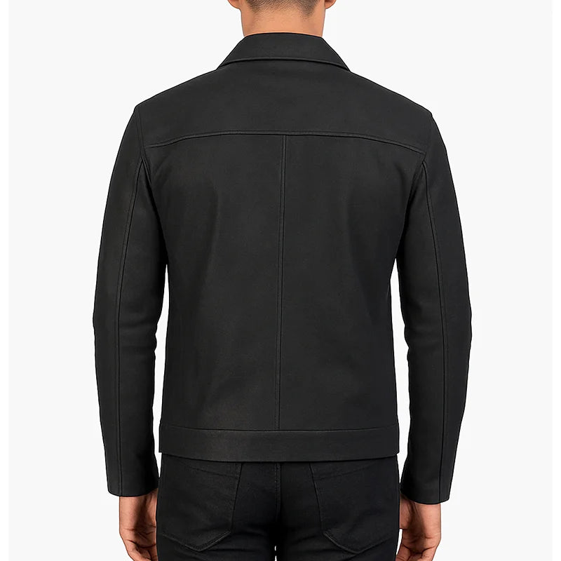 Black jacket worn by a person on a white background