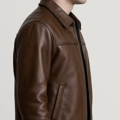 Brown leather jacket on a neutral background