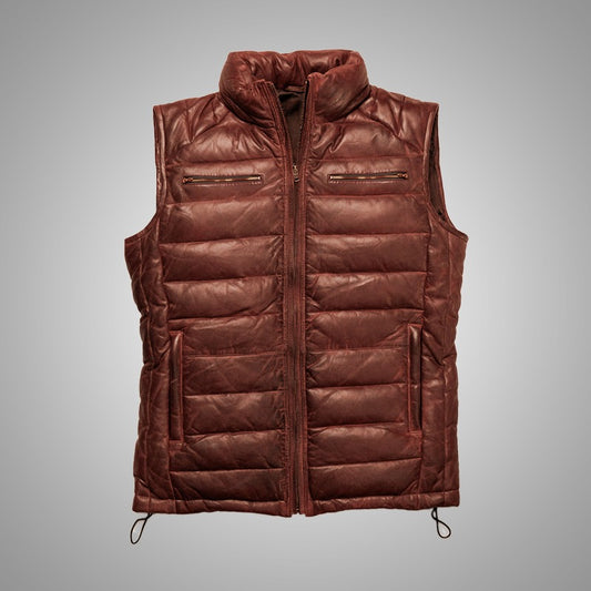 Brown quilted vest on a gray background
